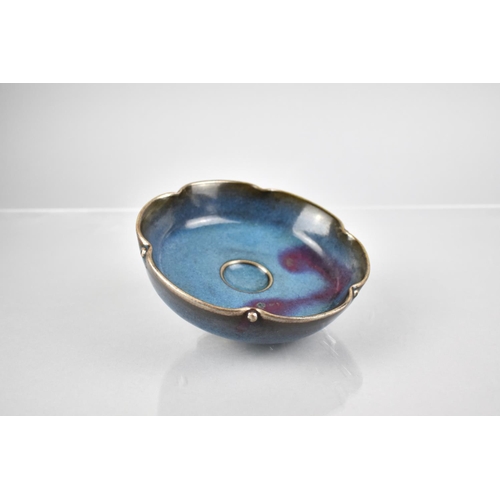 225 - A Chinese Jun Ware Glazed Scalloped Edged Bowl with Central Circular Well, 13.5cm Diameter