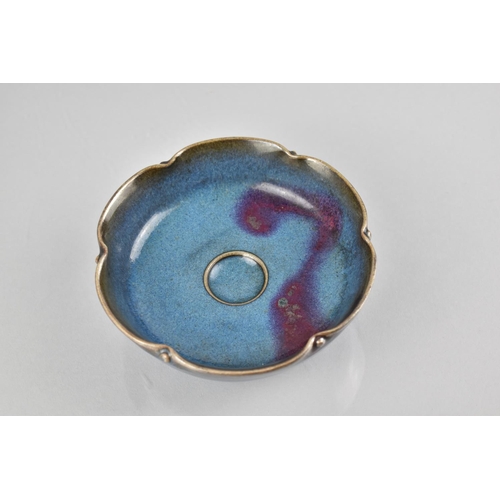 225 - A Chinese Jun Ware Glazed Scalloped Edged Bowl with Central Circular Well, 13.5cm Diameter