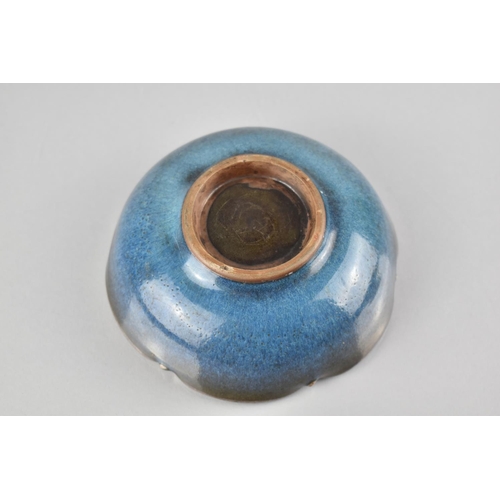 225 - A Chinese Jun Ware Glazed Scalloped Edged Bowl with Central Circular Well, 13.5cm Diameter