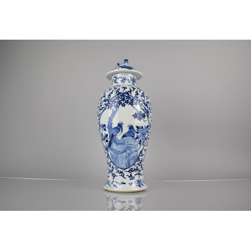 292 - A 19th Century Chinese Qing Period Porcelain Blue and White Baluster Vase and Cover Decorated with Q... 