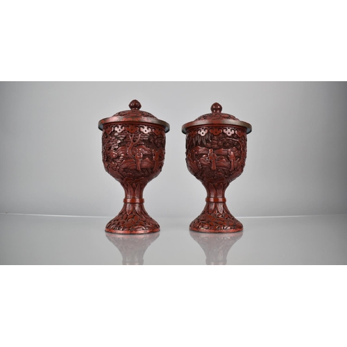 333 - A Pair of 19th/20th Century Cinnabar Pedestal Jars and Covers Decorated with Figures in Exterior Set... 