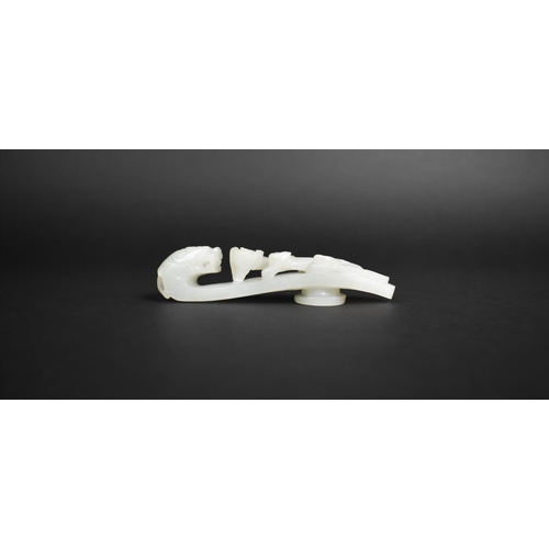 337 - A Chinese White Jade Chi Dragon Belt Buckle, 12cms