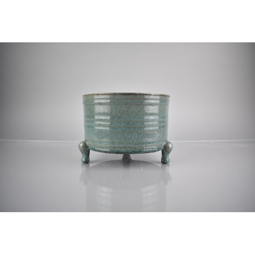 215 - A Chinese Celadon, Crackle Glazed Censer on Short Tripod Supports and Ribbed Body, 13.5cm High & 18c... 