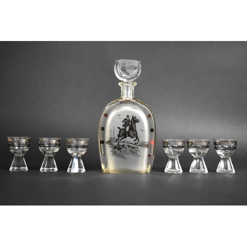 388 - An Art Deco Continental Decanter and 6 Tot Glass Set, The Decanter of Horseshoe Shape and Engraved w... 