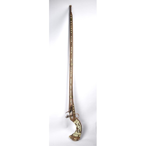 67 - A 19th Century Flintlock Jezail Iron Barrel with Flared Muzzle, the Wooden Stock with Brass and Bone... 