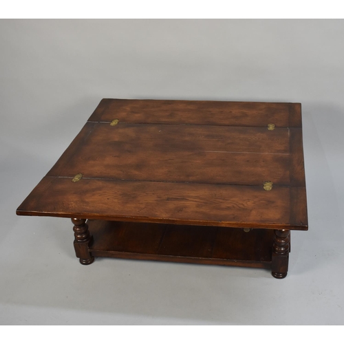 101 - A Good Quality Mid 20th Century Oak Rectangular Coffee Table with Two Hinged Flaps to Extend, Stretc... 