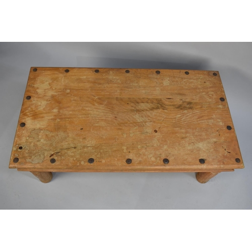 133 - A Modern far Eastern Metal Studded and Mounted Rectangular Coffee Table, 110cms Wide