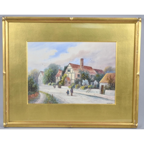 134 - A Framed Watercolour Depicting Village Street in Winter, Signed JD Morris, 35x25cms