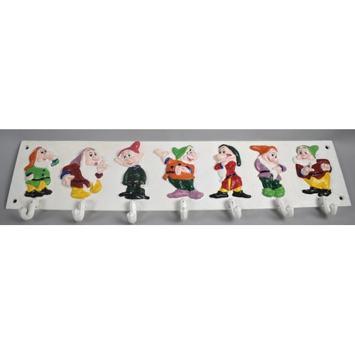 137 - A Modern Cast Metal Wall Mounted Coat/Cup Hook in the Form of the Seven Dwarves, 59cms Wide, Plus VA... 