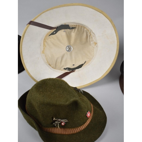 188 - A Collection of Various Vintage Hats including Pith Example