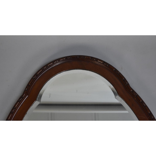 224 - A Mid 20th Century Mahogany Framed Oval Wall Mirror, 82cms Wide