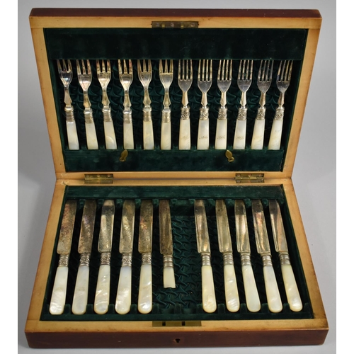 24 - An Edwardian Mahogany Canteen Containing 12 Mother of Pearl Handled Fruit Knives and Forks, One Knif... 