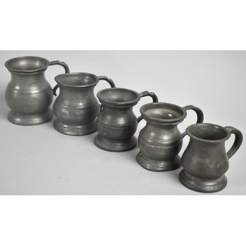 31 - A Collection of Five Small Pewter Measures, One Inscribed for LMS Hotels