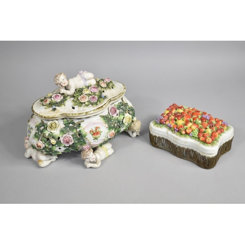 318 - A 19th/20th Century Sitzendorf Porcelain Casket and Cover of Quatrefoil form having Encrusted Floral... 