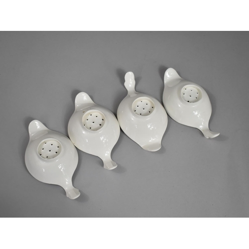 329 - A Set of Four 19th Century Creamware Tea Strainers, with Scrolled Handles and Plain Lips, 13cm wide