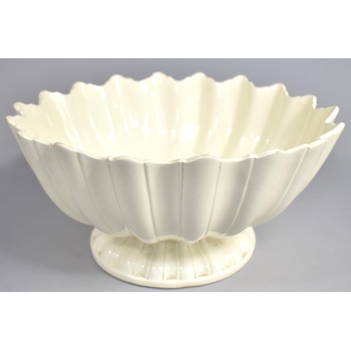 330 - A 19th Century Creamware Footed Bowl of Reeded Form with Wavy Rim, 24cm diameter and 12.5cm high