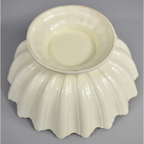 330 - A 19th Century Creamware Footed Bowl of Reeded Form with Wavy Rim, 24cm diameter and 12.5cm high