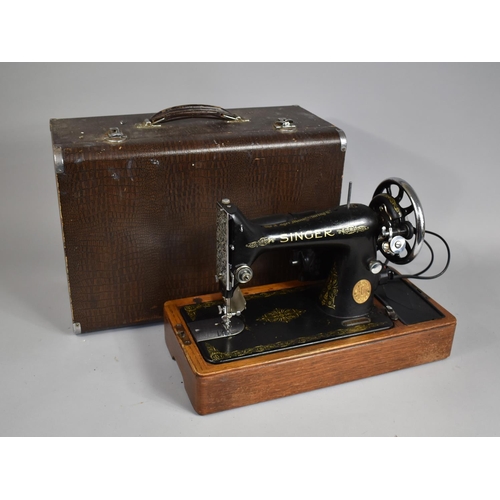 383 - A Singer Electric Sewing Machine in Case with Foot Pedal