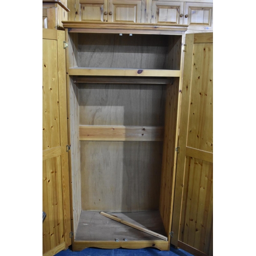 394 - A Modern Pine Wardrobe with Single Shelf, 86cms Wide and 180cms High