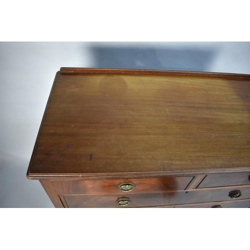 403 - An Edwardian Mahogany Bedroom Chest of Two Short and Three Long Drawers, Galleried Back, 114cms Wide