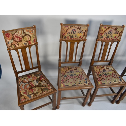 406 - A Set of Four Edwardian Oak Dining Chairs with Tapestry Top Rails and Matching Seats