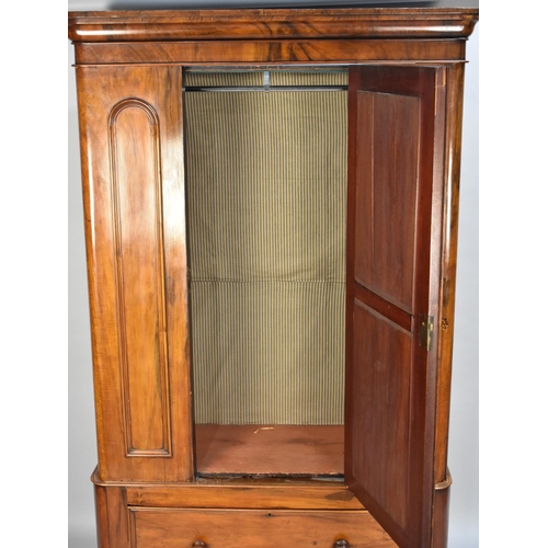 412 - A Victorian Mahogany Double Wardrobe with Mirror Door and Base Drawer, 116cms Wide