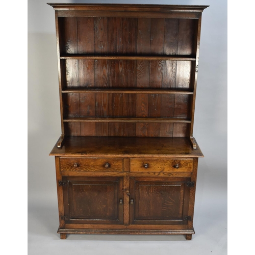 420 - A Mid 20th Century Oak Dresser with Two Drawers Over Cupboards, Three Shelf Plate Rack, 122cms Wide