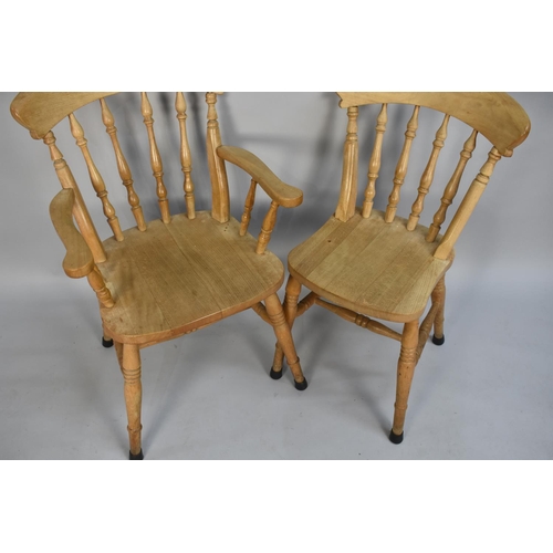 421 - A Pine Rectangular Kitchen Table with Six Chairs to include Two Carvers