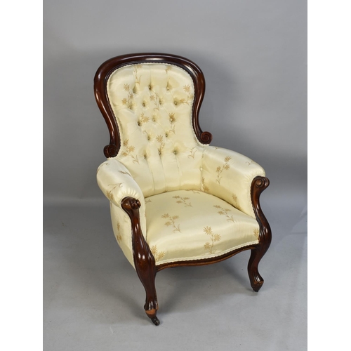 431 - A Reupholstered Late 19th Century Mahogany Framed Balloon Backed Button Upholstered Ladies Arm Chair