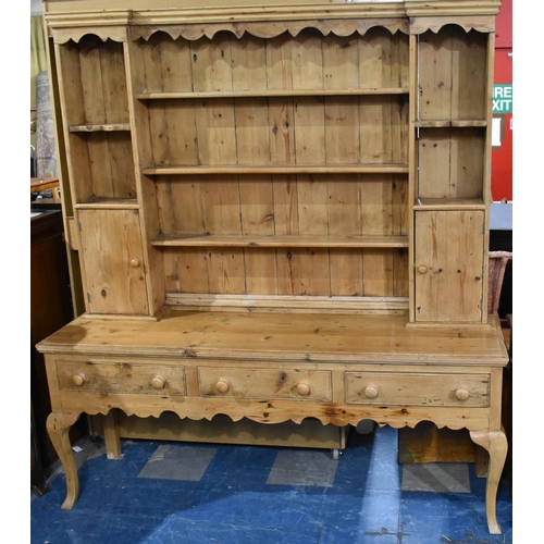 434 - A Pine Kitchen Dresser, Base with Three Drawers and Cabriole Supports, Raised Plate Rack with Cupboa... 