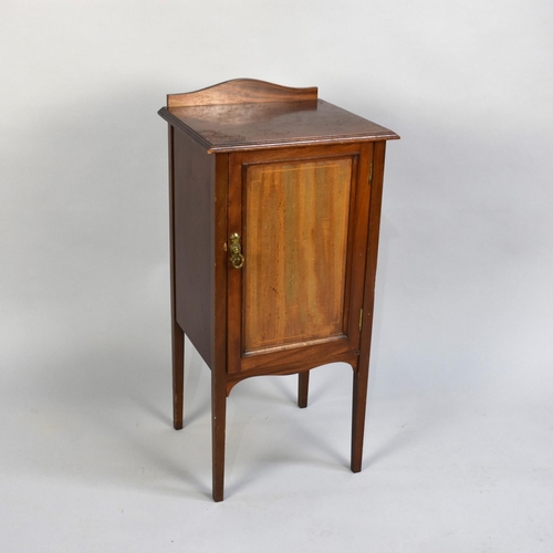 47 - An Edwardian Mahogany Bedside Cupboard with Panelled Door to Shelved Interior and Raised Rear Galler... 