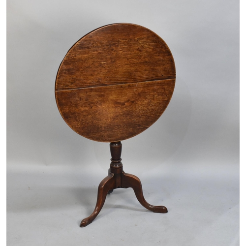 58 - A 19th Century Circular Topped Snap Top Tripod Table, 65cms Diameter