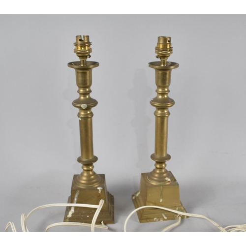 77 - A Pair of Brass Table Lamps in the Form of Candlesticks, No Shades, 36cms High