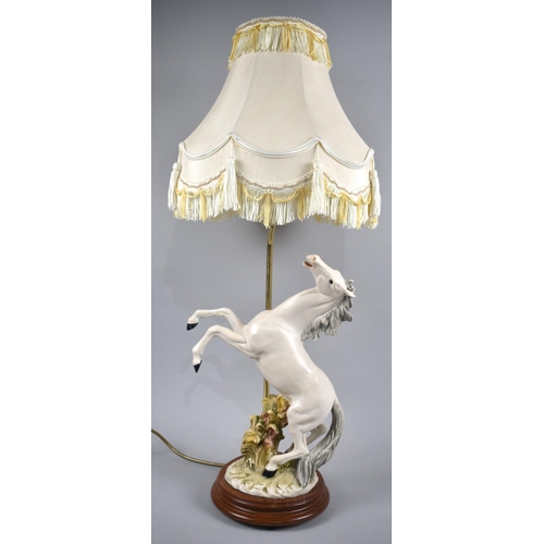 79 - A Modern Capodimonte Table Lamp in the Form of Rearing Stallion, Complete with Shade, 75cms High