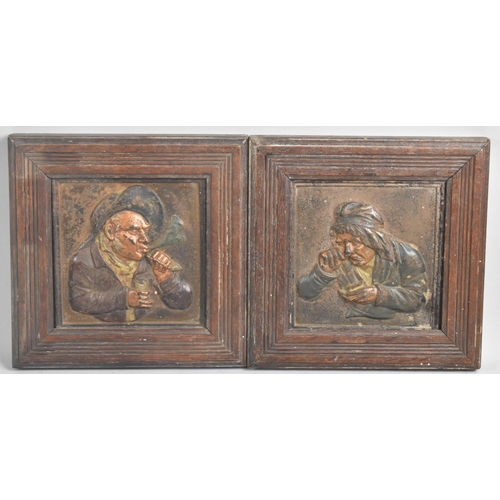 8 - A Pair of Hand Coloured Cast Iron Relief Plaques Depicting Snuff Taker and Pipe Smoker, Each Set in ... 