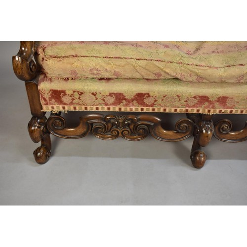 427 - A Walnut Framed High Backed and Winged Three Piece Suite with Carved Supports and Rails and Scrolled... 