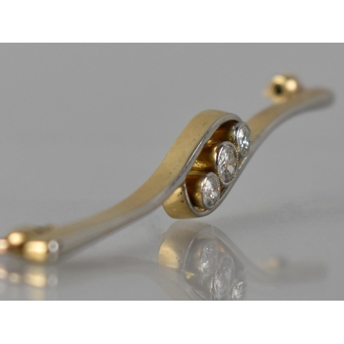 45 - A Diamond Trilogy Brooch, Central Bezel Set Diamond Measuring 4mm Diameter Approx in White Metal wit... 