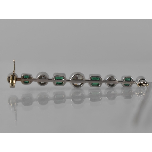 4 - An Art Deco Diamond and Emerald Bar Brooch in White Metal, Central Round Cut Diamond Measuring 4.3mm... 
