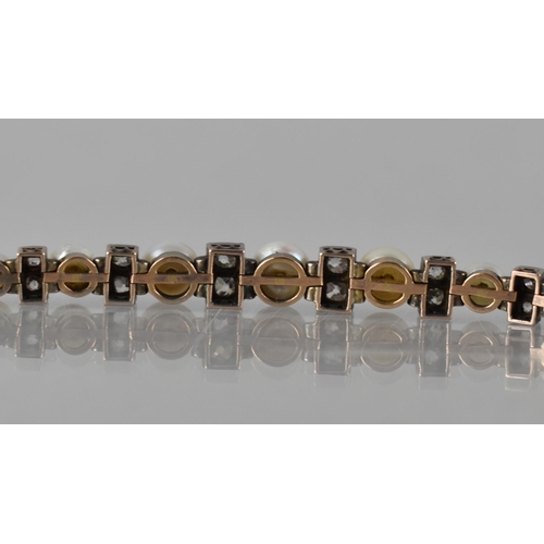 5 - An Early 20th Century Diamond and Pearl Line Bracelet in 9ct White Gold and Yellow Metal, Central Wh... 