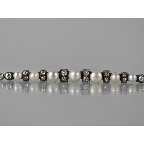 5 - An Early 20th Century Diamond and Pearl Line Bracelet in 9ct White Gold and Yellow Metal, Central Wh... 