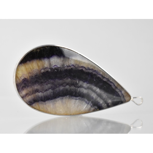 158 - A Large Silver Mounted Blue John Pendant, Teardrop Shape Shallow Cabochon Measuring 77mm by 39mm Max... 