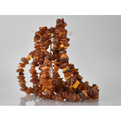 204 - A Long Amber Chip Necklace, Approx 130cms, 77.5gms