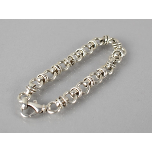 162 - A Silver Fancy Link Bracelet, Lobster Clasp and with Import Mark for Birmingham Makers Mark FA, 25.2... 