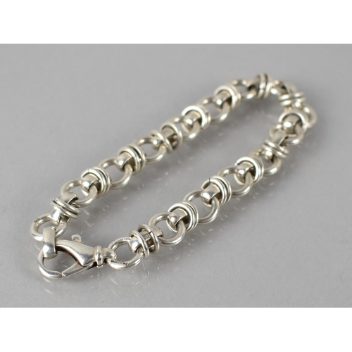 162 - A Silver Fancy Link Bracelet, Lobster Clasp and with Import Mark for Birmingham Makers Mark FA, 25.2... 