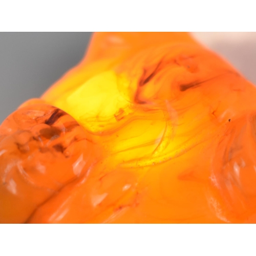 208 - A Vintage Carved Amber Study of a Seated Buddha, 38mm High, 11.2gms