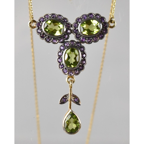 65 - An 9ct Gold Chain Ornately Mounted with Peridot, Amethyst Floral Motif in Gilt Silver, Three Oval Cu... 