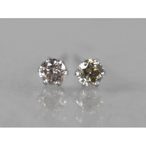 66 - A Pair of Platinum and Diamond Stud Earrings Featuring Round Brilliant Cut Diamonds In Six Claws, (W... 