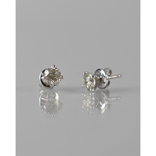 67 - A Pair of 18ct White Gold and Diamond Solitaire Studs, Round Brilliant Cut Diamonds with Total Weigh... 