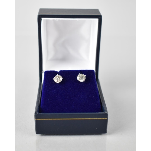 67 - A Pair of 18ct White Gold and Diamond Solitaire Studs, Round Brilliant Cut Diamonds with Total Weigh... 