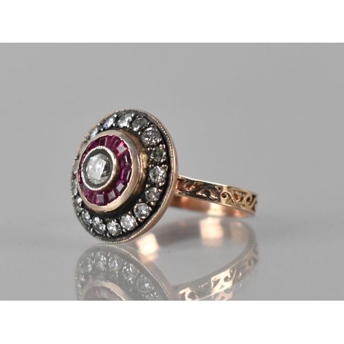 80 - A Middle Eastern Diamond and Ruby Ring, Central Round Cut Diamond Bezel Set Measuring 4mm Diameter, ... 